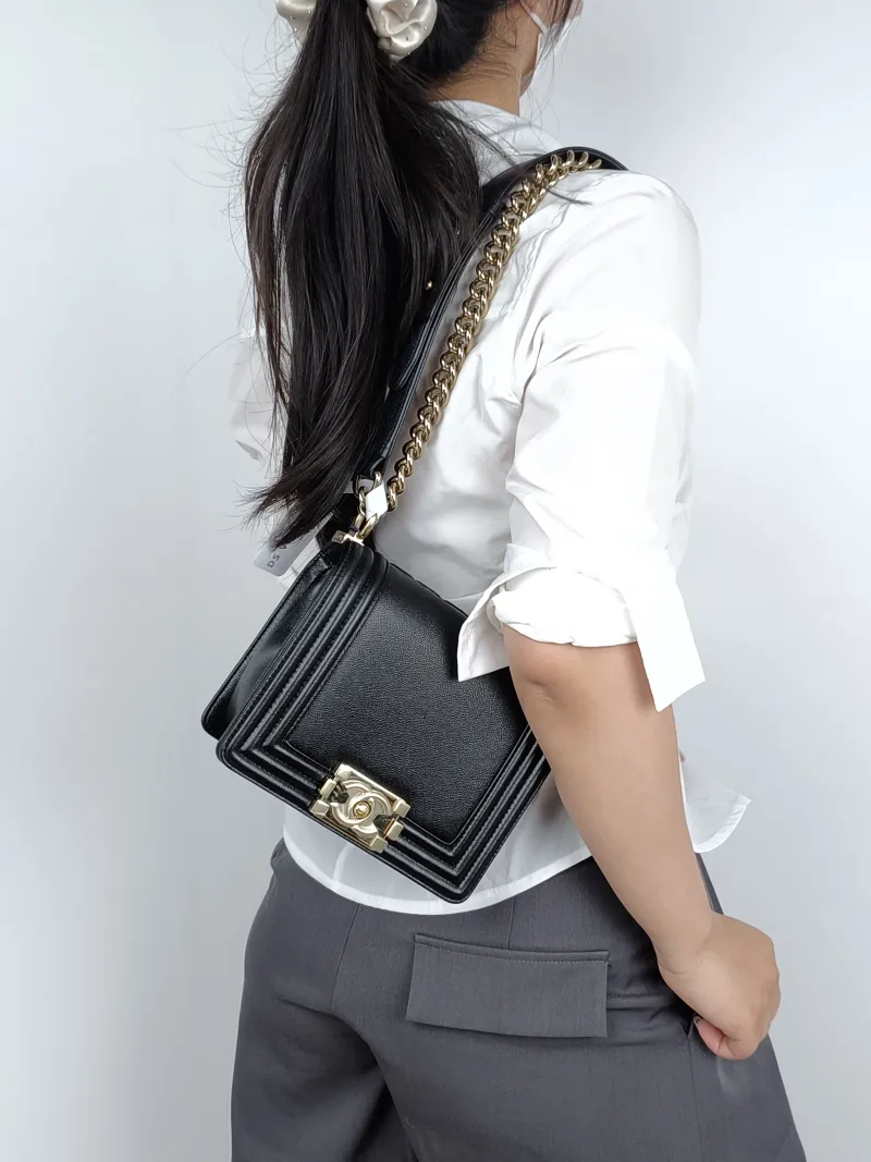 Chanel Crossbody Bag Le Boy​Black Calfskinmini18 × 8.5 × 16 cm — on-model view 2 of 3