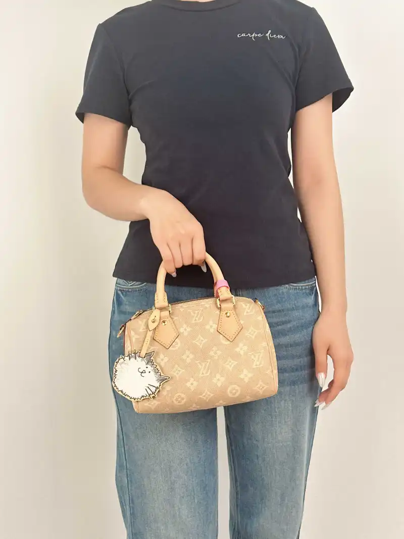 Louis Vuitton Crossbody Bag Speedy20 Beige · Charm PVC Small 20.5 × 12 × 13.5 cm — on-model view 1 of 3