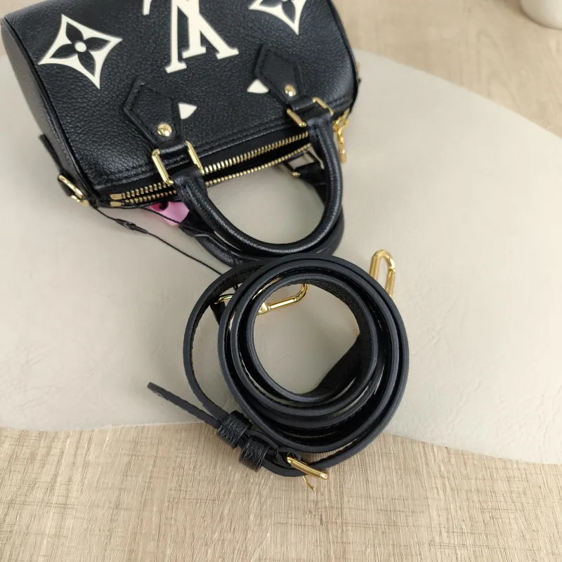 Louis Vuitton Crossbody Bag Speedy Nano Black · White Empreinte Embossed Calfskin nano 16 × 7.5 × 10 cm — detail view 9 of 9