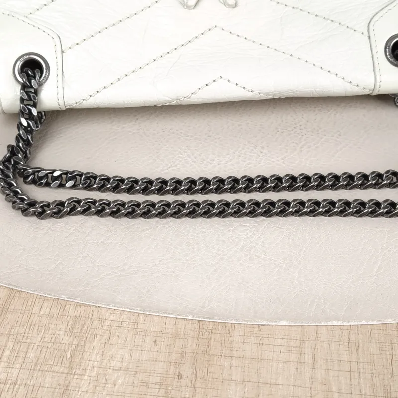 SAINT LAURENT Crossbody Bag Niki D Calfskin Small 21 × 7.5 × 16 cm — detail view 2 of 12