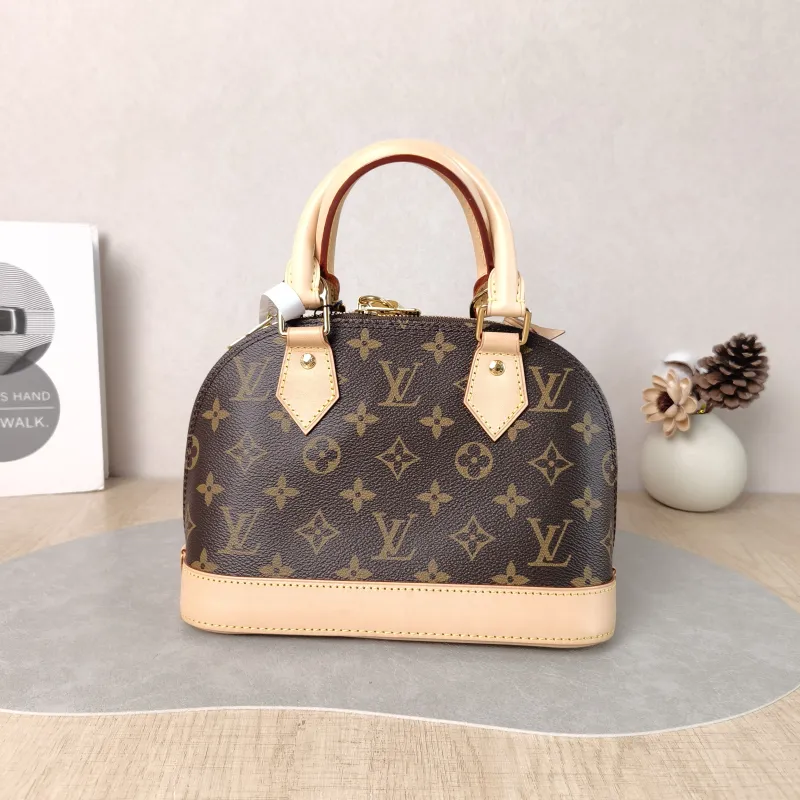 Louis Vuitton Crossbody Bag Alma BB Monogram PVC BB 23.5 × 11.5 × 17.5 cm — cover view 3 of 5