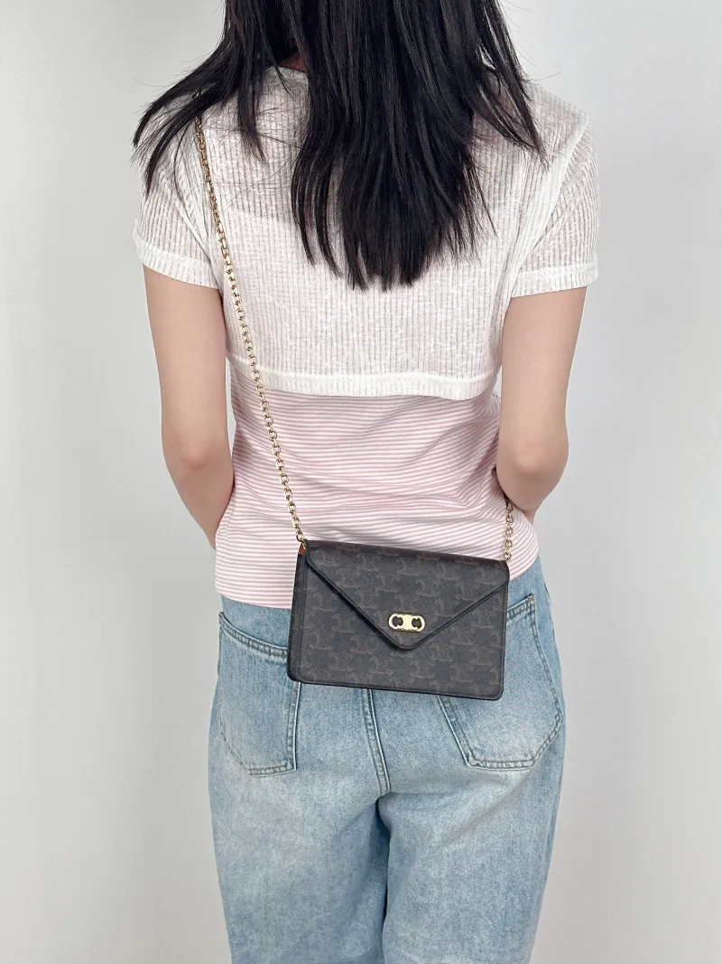 CELINE Crossbody Bagmallon triomphe woc Monogram PV Cmini19.5 × 4 × 13 cm — on-model view 1 of 3