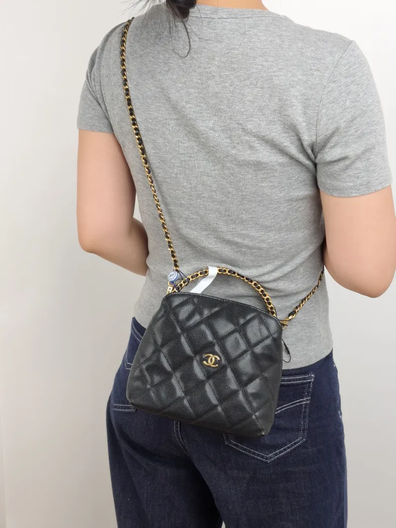 Chanel Crossbody Bag Woven Black Grained Calfskin One Size 18.5 × 7 × 14.5 cm — on-model view 1 of 3