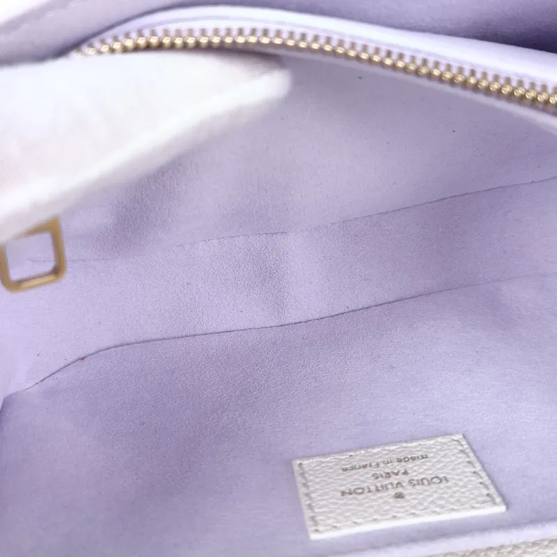Louis Vuitton Crossbody Bag Pochette Métis East West White · Monogram Empreinte Embossed Calfskin Small 21.5 × 6 × 13.5 cm — detail view 10 of 15