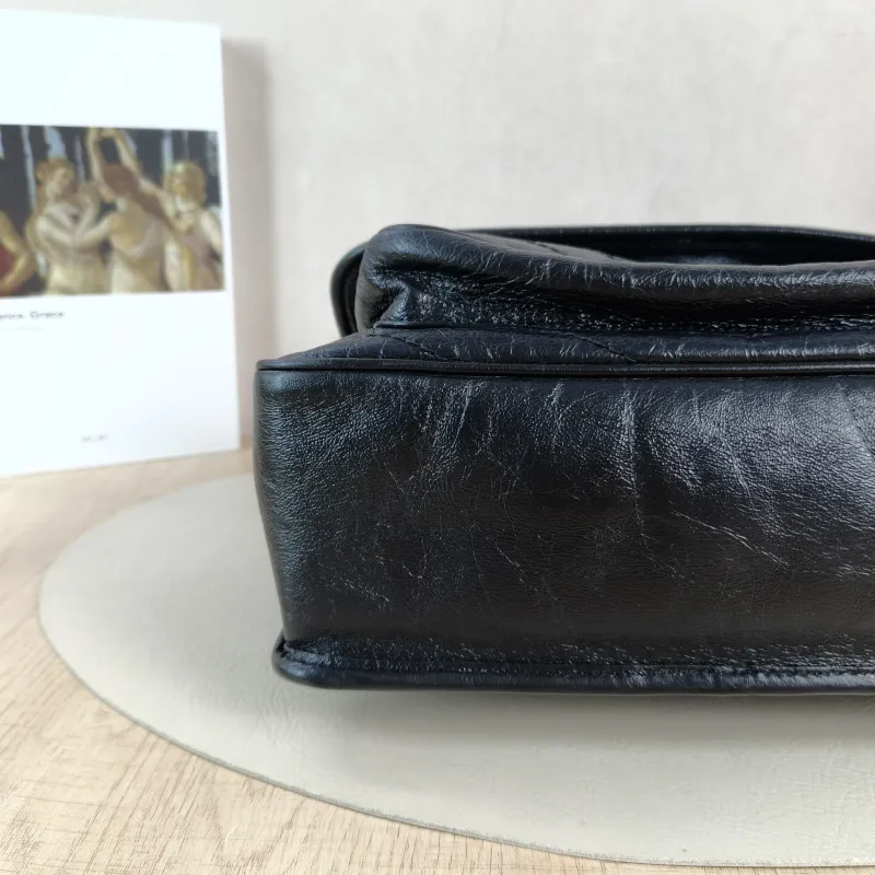 SAINT LAURENT Crossbody Bag Niki Black Waxed Leather Calfskin Medium 28 × 8.5 × 20 cm — detail view 6 of 13