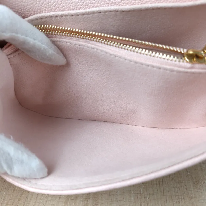 Louis Vuitton Crossbody Bag Pochette Métis East West Monogram Empreinte Embossed Calfskin Small 21.5 × 6 × 13.5 cm — detail view 4 of 14