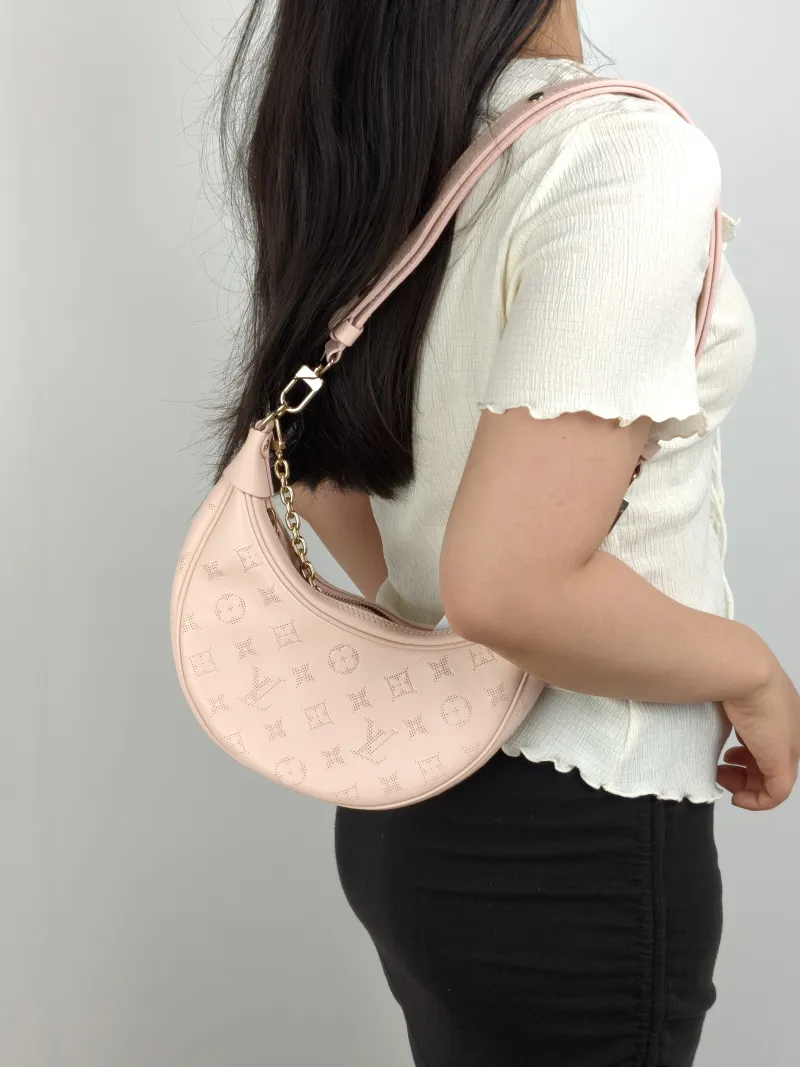 Louis Vuitton Crossbody Bag Loop Pink Calfskin Small 23 × 6 × 13 cm — on-model view 3 of 3