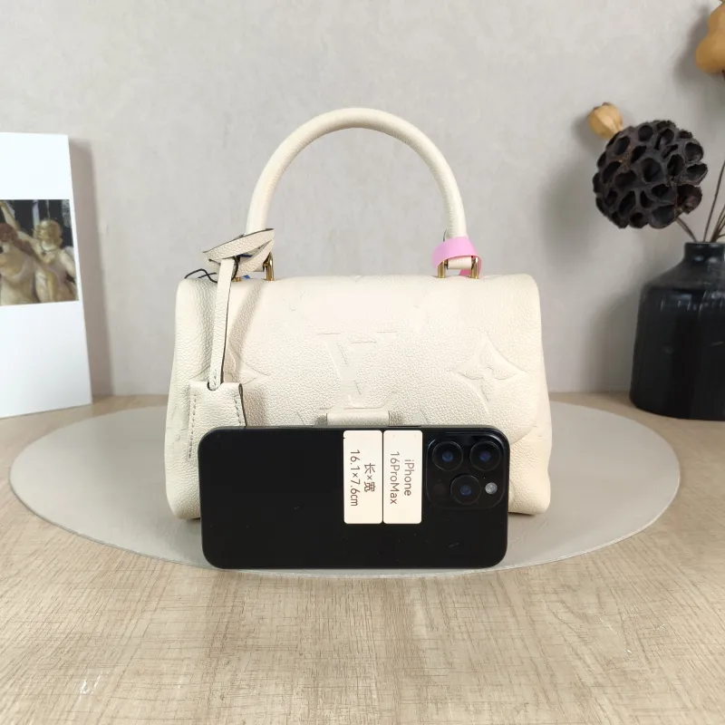 Louis Vuitton Crossbody Bag MADELEINE Beige Monogram Empreinte Embossed Calfskin BB 24 × 8.5 × 17 cm — cover view 4 of 5