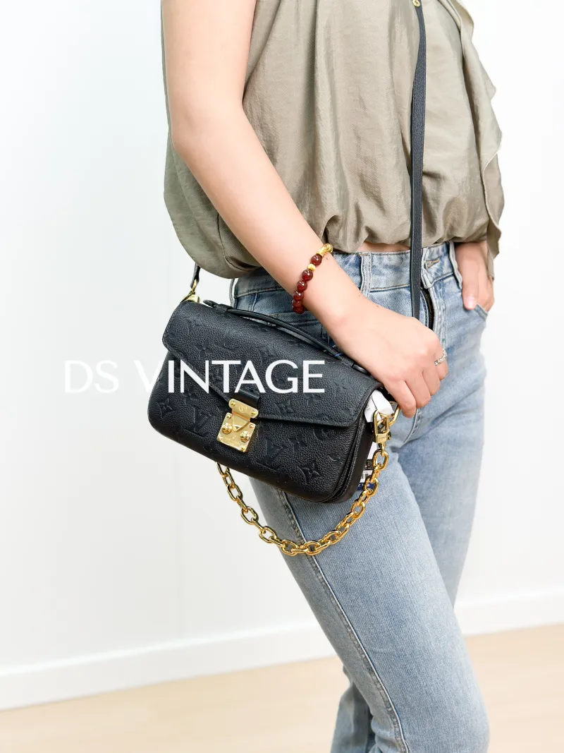 Louis Vuitton Crossbody Bag Pochette Métis East West Black Empreinte Embossed Calfskin Small 21.5 × 6 × 13.5 cm — on-model view 3 of 3