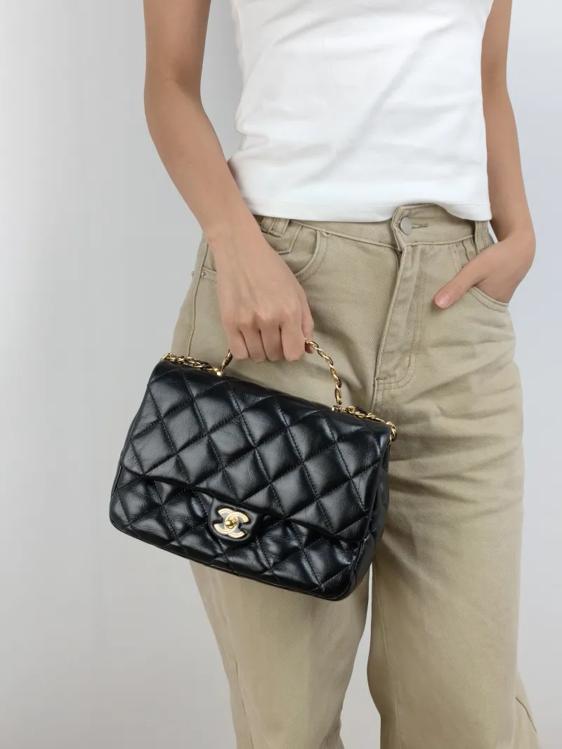 Chanel Crossbody Bag 23a Black SL ambskin Medium 25 × 10 × 16 cm — on-model view 3 of 3