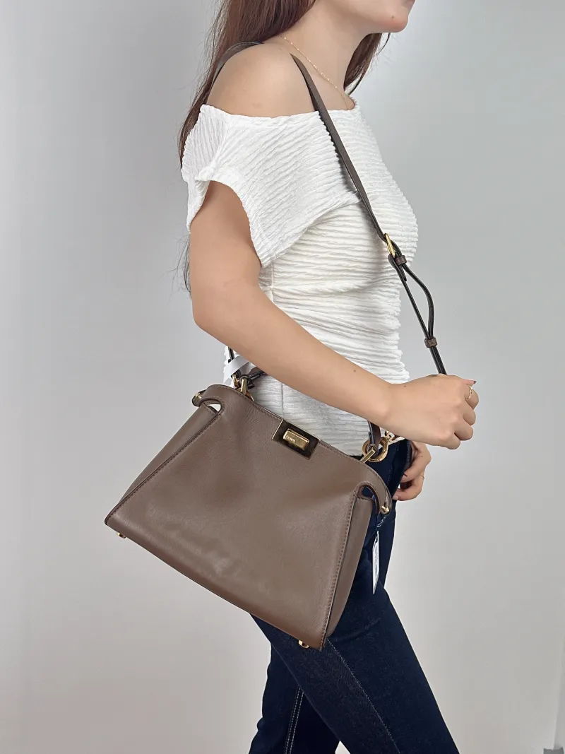 FENDI Crossbody Bag Peekaboo Essentially Small Brown Calfskin Small27 × 11 × 21 cm — on-model view 1 of 2
