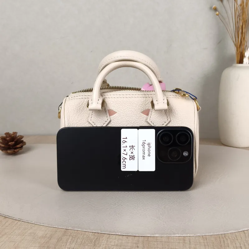 Louis Vuitton Crossbody Bag Speedy Nano White · Pink Empreinte Embossed Calfskin nano 16 × 7.5 × 10 cm — cover view 2 of 5