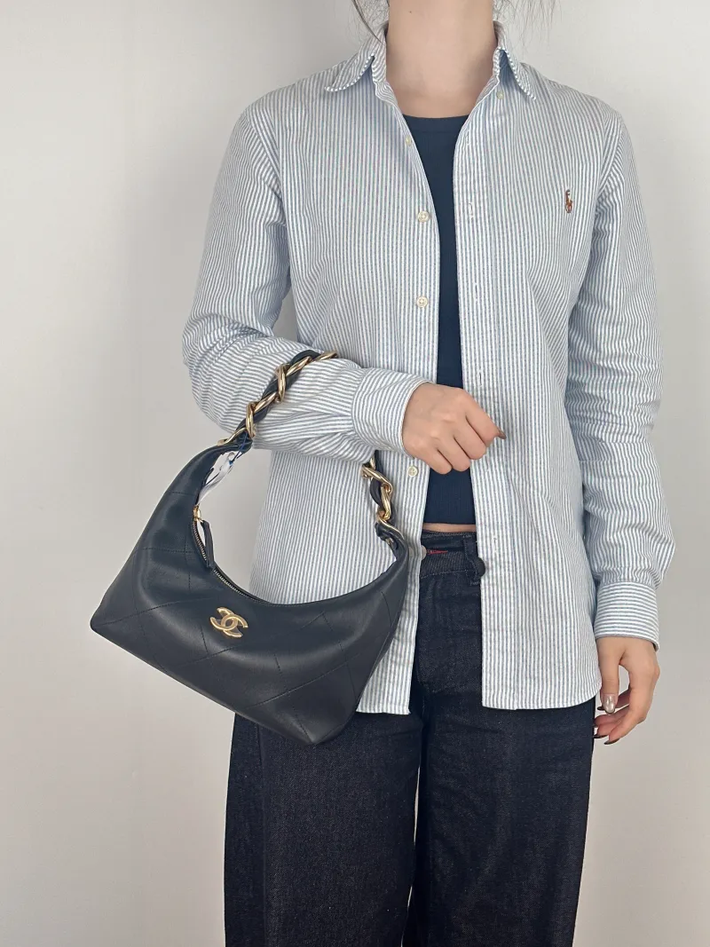 Chanel Shoulder Bag hobo Black with Gold-Tone Hardware Calfskin One Size 24 × 7 × 27 cm — on-model view 2 of 2