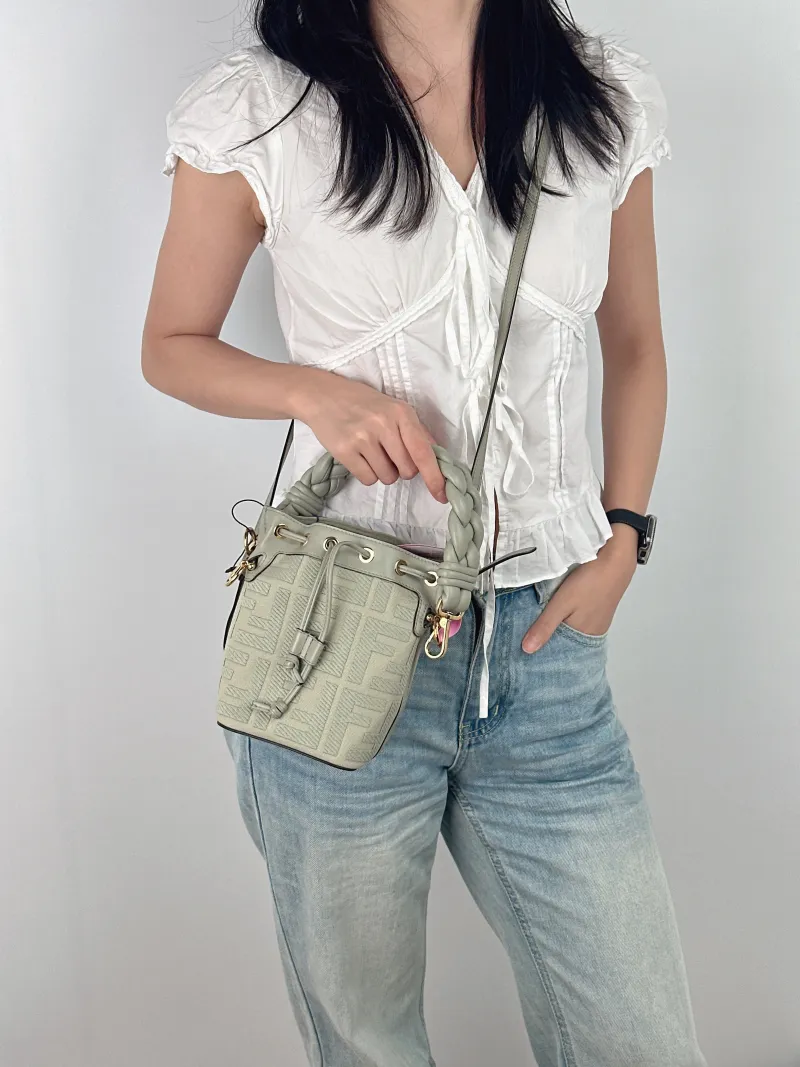 FENDI Crossbody Bag Mon Tresor Bucket Bag Green Canvas Mini 12 × 10 × 18 cm — on-model view 3 of 3
