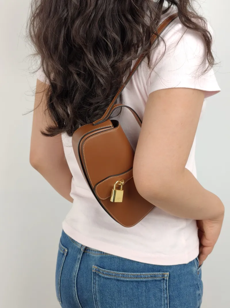 CELINE Crossbody Bag TABOU Brown Calfskin Mini 18 × 5 × 8 cm — on-model view 2 of 2