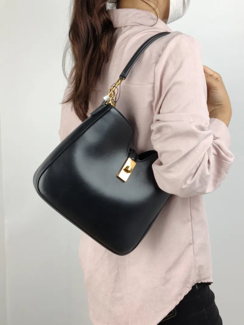 CELINE Shoulder Bag CAMILLE 16 SOFT Shoulder Bag Black Calfskin Small 24.5 × 5 × 21.5 cm — on-model view 2 of 2