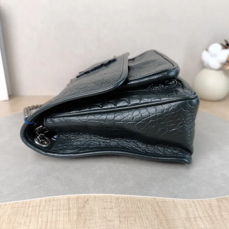 SAINT LAURENT Crossbody Bag Niki D Green Calfskin Medium 28 × 8.5 × 20 cm — detail view 11 of 11