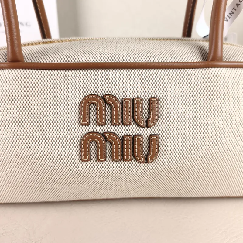 Miumiu Top Handle Bag Beau Brown Canvas · Calfskin 28 × 8 × 11.5 cm — detail view 12 of 13