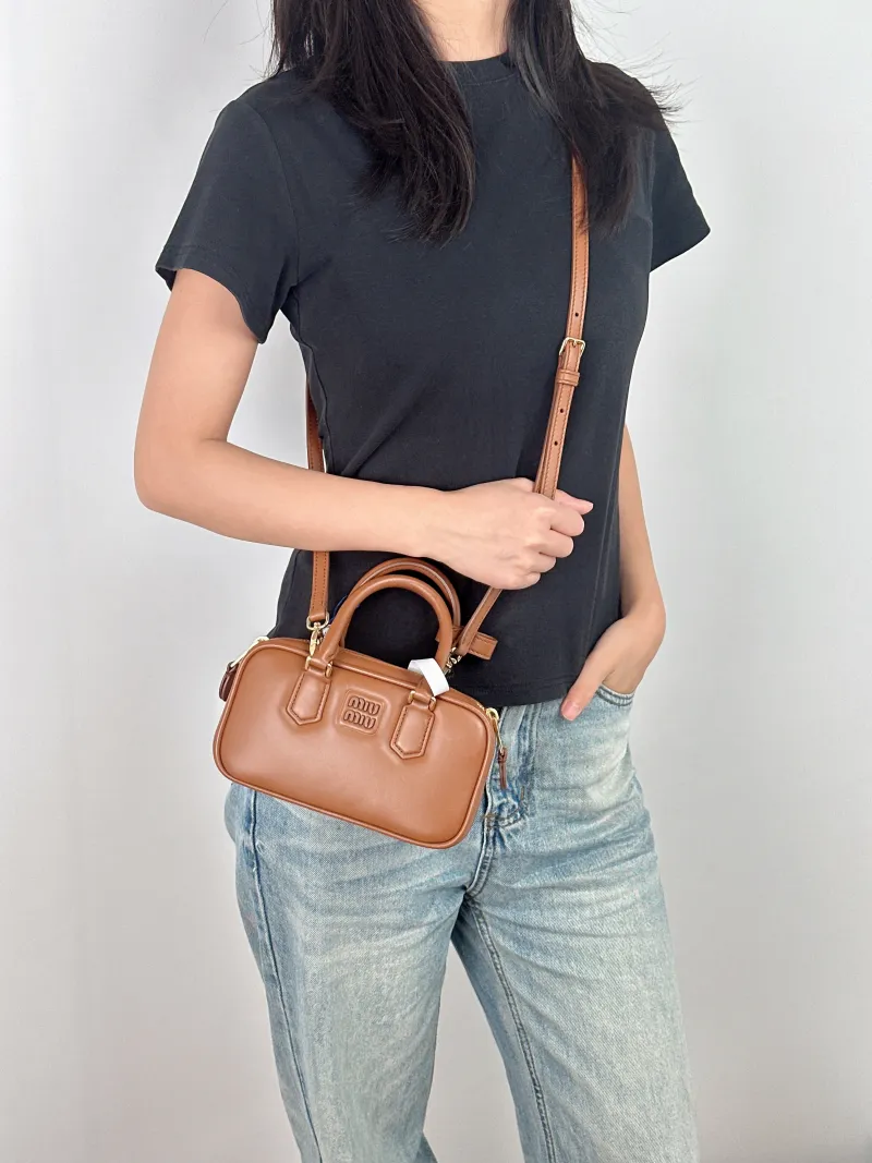 Miumiu Top Handle Bag Arcadie Collection Bowling Bag CC alfskinmini19 × 5 × 10 cm — on-model view 2 of 3
