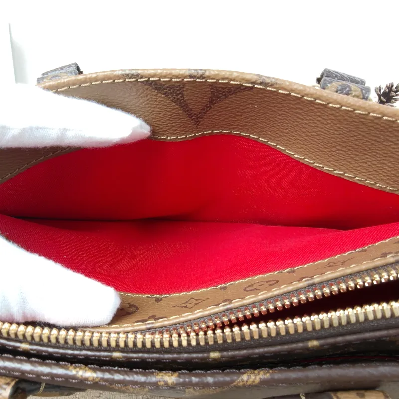Louis Vuitton Crossbody Bag Onthego East West Monogram PVC Small25 × 10 × 13 cm — detail view 9 of 12