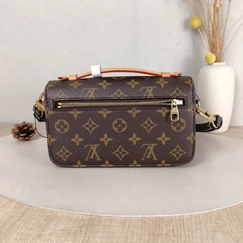 Louis Vuitton Crossbody Bag Pochette Métis East West Monogram PVC Small 21.5 × 6 × 13.5 cm — cover view 2 of 5