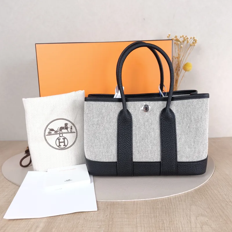Hermès Top Handle Bag Neo Garden 23 Mini Black · Beige Canvas · Negonda Calfskinmini23 × 10 × 16 cm — cover view 6 of 6