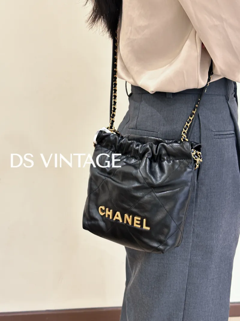 Chanel Shoulder Bag 22Bag Black CC alfskin Mini 20 × 6 × 19 cm — on-model view 3 of 3