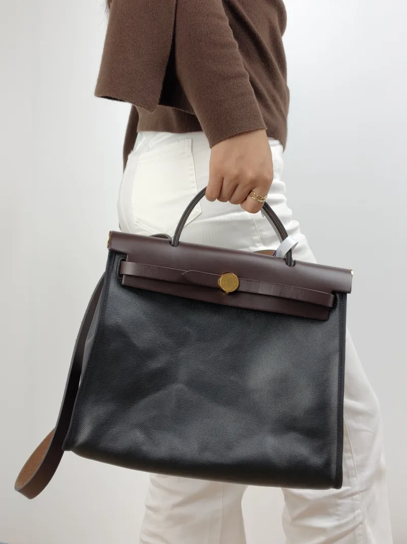 Hermès Crossbody Bag Herbag 31 Black Canvas Calfskin Medium 30.5 × 11 × 25.5 cm Z — on-model view 2 of 2