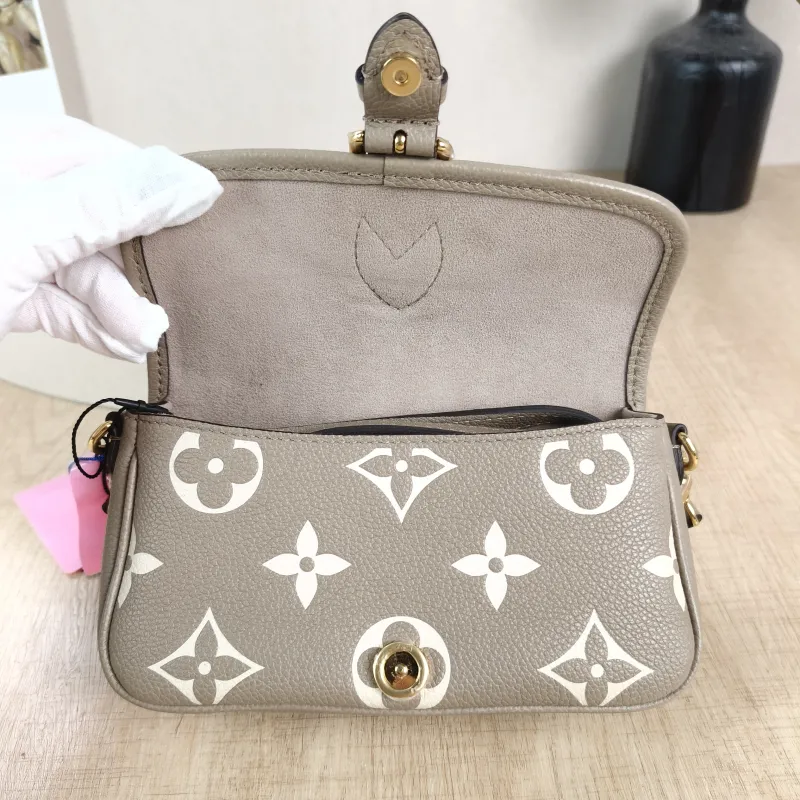Louis Vuitton Crossbody Bag Diane Baguette Bag Empreinte Embossed Calfskin Monogramnano19 × 6 × 10.5 cm — detail view 12 of 12