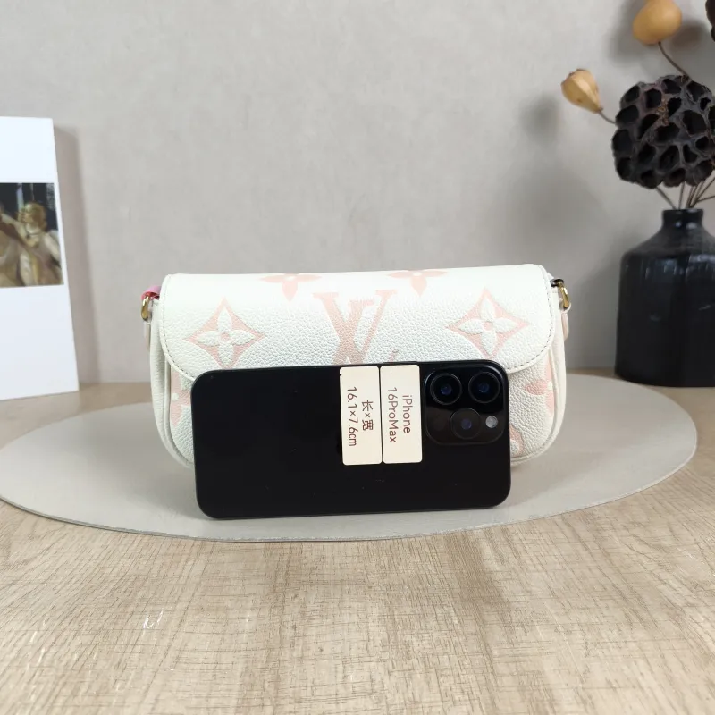 Louis Vuitton Crossbody Bag IVY White · Pink Empreinte Embossed Calfskin Small 23.5 × 4.3 × 12 cm — cover view 4 of 5