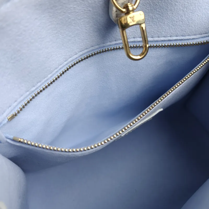 Louis Vuitton Shoulder Bag Onthego White · Blue Monogram Empreinte Embossed Calfskin Small 25 × 11.5 × 19 cm — detail view 2 of 11