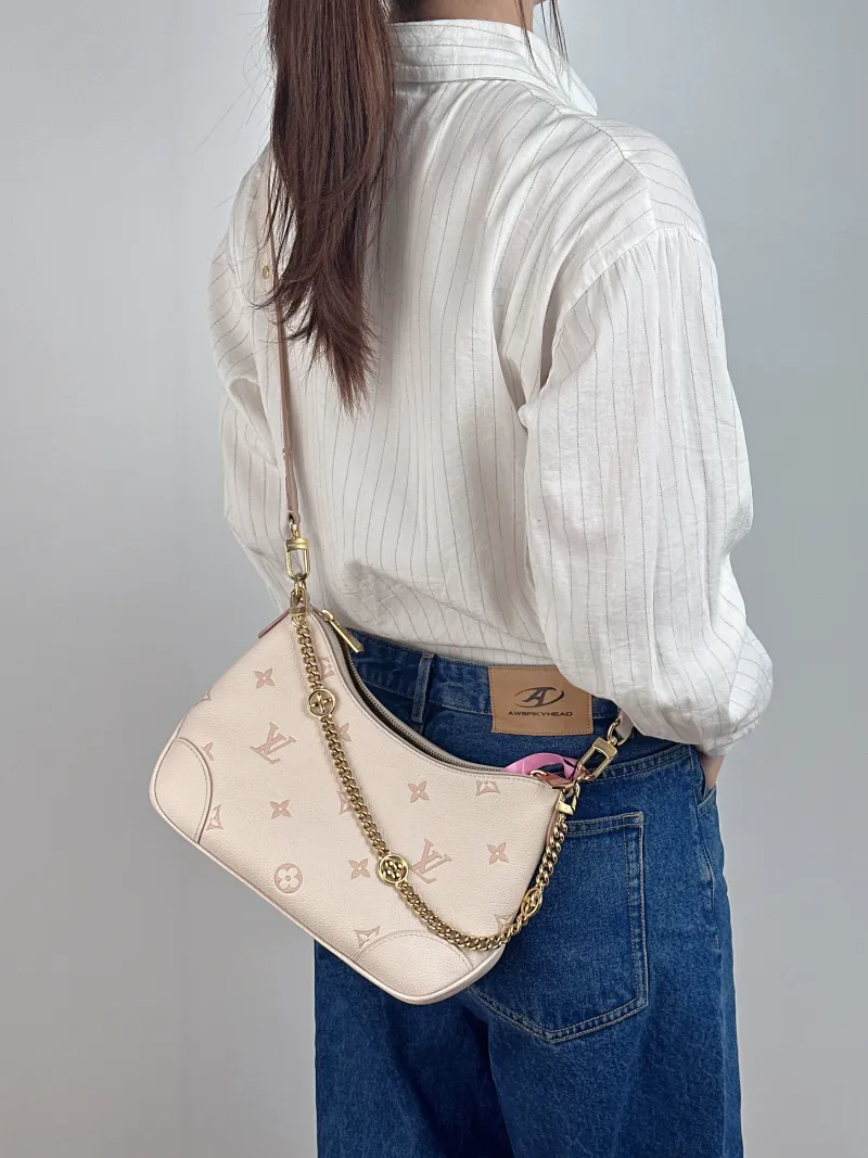 Louis Vuitton Crossbody Bag Boulogne Beige Monogram Empreinte Embossed Calfskin Small 26 × 9.5 × 16 cm — on-model view 2 of 2