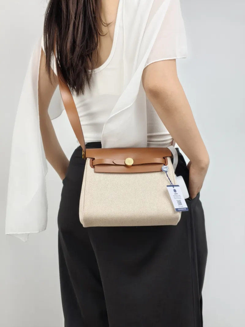Hermès Shoulder Bag Herbag Zip 20 Beige Brown Calfskin，Canvas Mini 20 × 7 × 17 cm K — on-model view 2 of 2