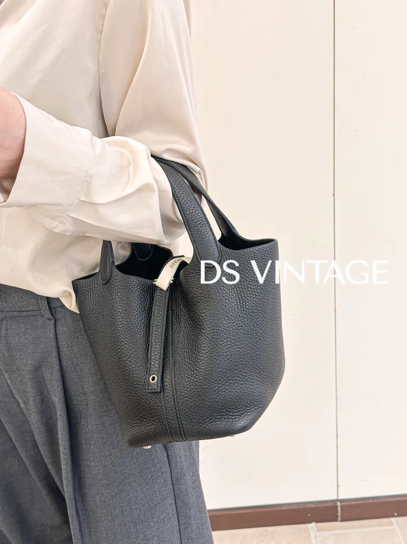 Hermès Top Handle Bag Picotin Lock 18 18Black Clemence Taurillon TC Calfskin Small18 × 13 × 19 cm — on-model view 1 of 3