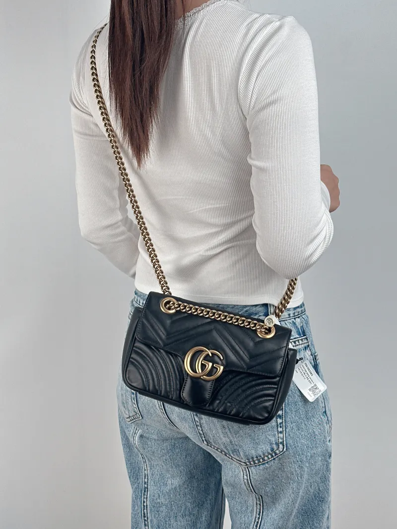GUCCI Crossbody Bag GG Marmont Small Marmont 22 Black CC alfskin Small 22 × 6 × 13 cm — on-model view 2 of 2