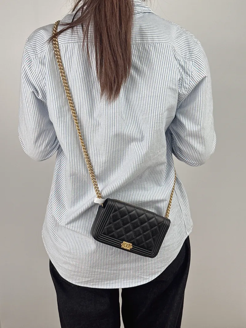 Chanel Crossbody Bag Le Boy​ WOC Black Grained Calfskin Mini 17.5 × 3.5 × 10 cm Microchip Edition — on-model view 2 of 2