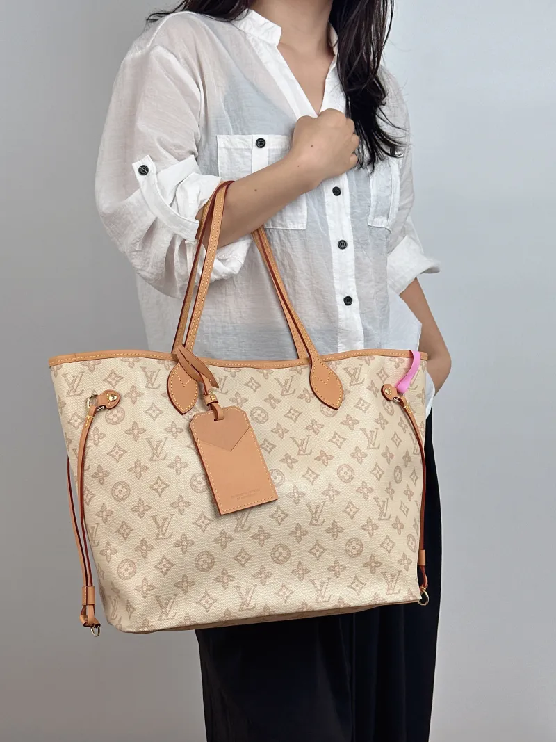 Louis Vuitton Shoulder Bag Neverfull PVC Medium 31 × 14 × 28 cm — on-model view 1 of 2