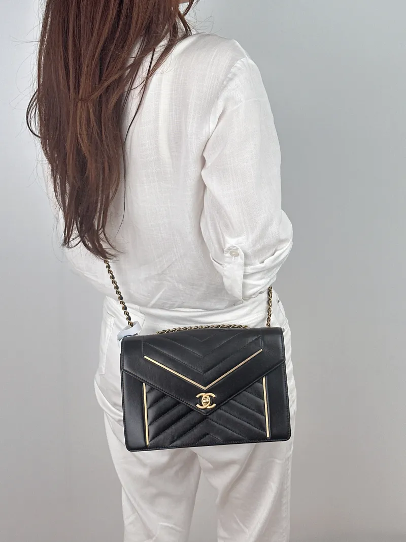 Chanel Crossbody Bag Crossbody Bag Black Lambskin One Size24 × 7 × 16 cm — on-model view 1 of 2