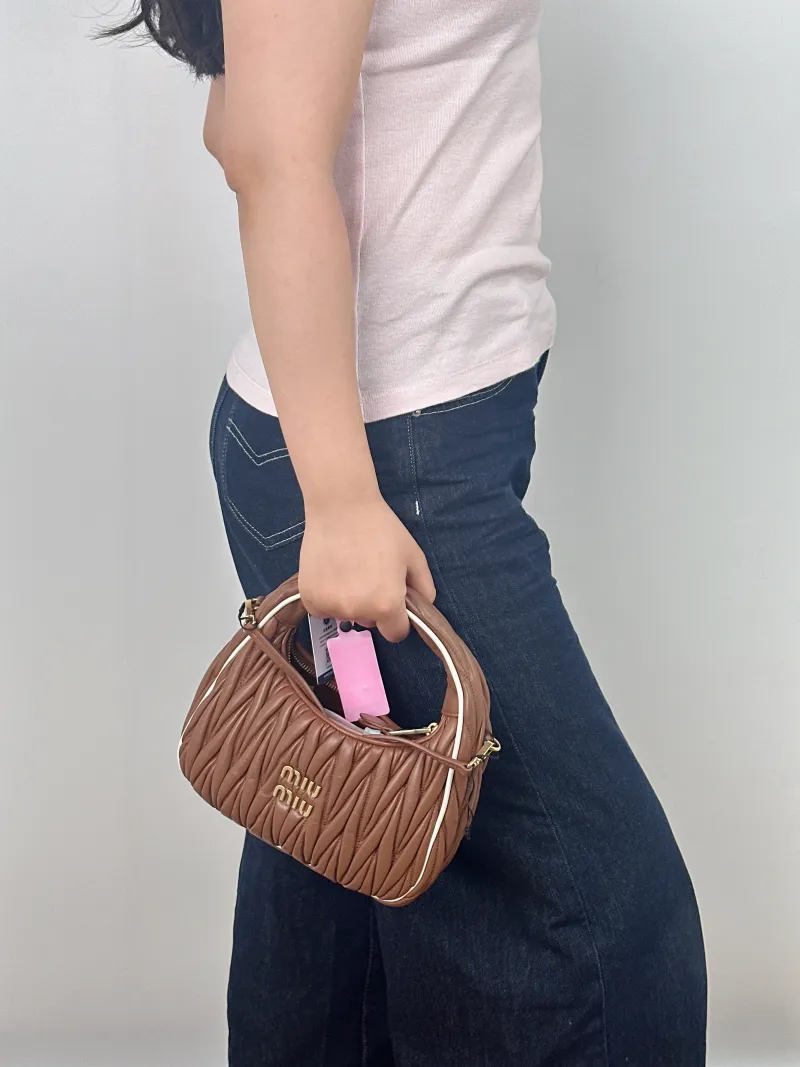 Miumiu Shoulder Bag Wander Matelassé Hobo Lambskin Small 20 × 6 × 17 cm — on-model view 1 of 2