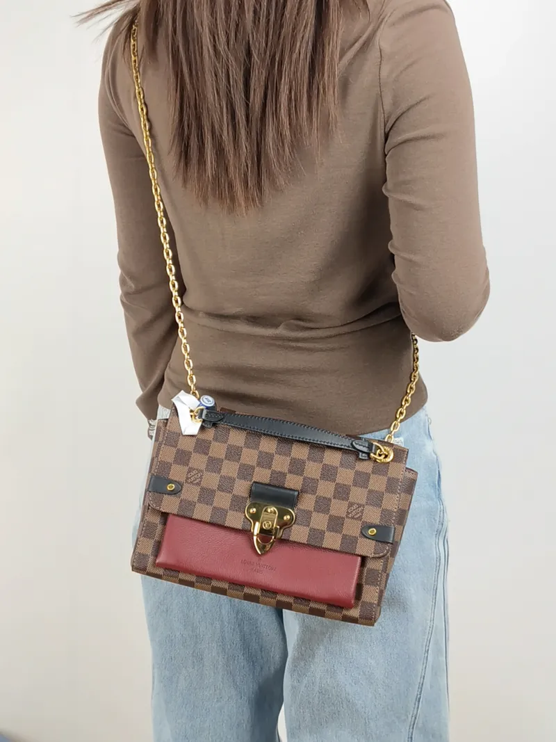 Louis Vuitton Shoulder Bag VAVIN Red · PVC Small 25 × 9.5 × 17 cm — on-model view 2 of 2