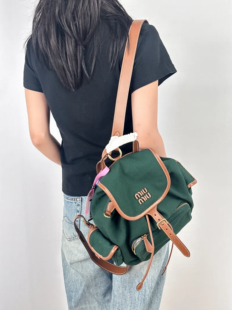 Miumiu Backpack Backpack Green Canvas Large25 × 12.5 × 29.5 cm — on-model view 2 of 3