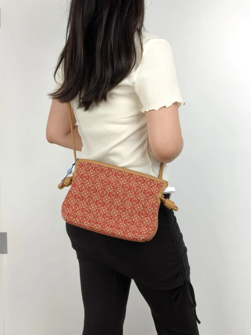 LOEWE Crossbody Bag Flamenco Red Monogram Canvas mini24 × 9 × 18 cm — on-model view 3 of 3