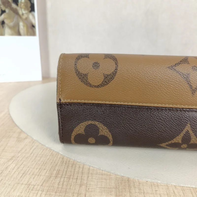 Louis Vuitton Crossbody Bag Onthego East West Two Straps Monogram PVC Small 25 × 10 × 13 cm — detail view 11 of 12