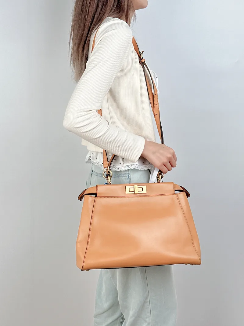 FENDI Top Handle Bag Peekaboo Brown Calfskin Medium 33.5 × 13 × 25.5 cm — on-model view 1 of 2