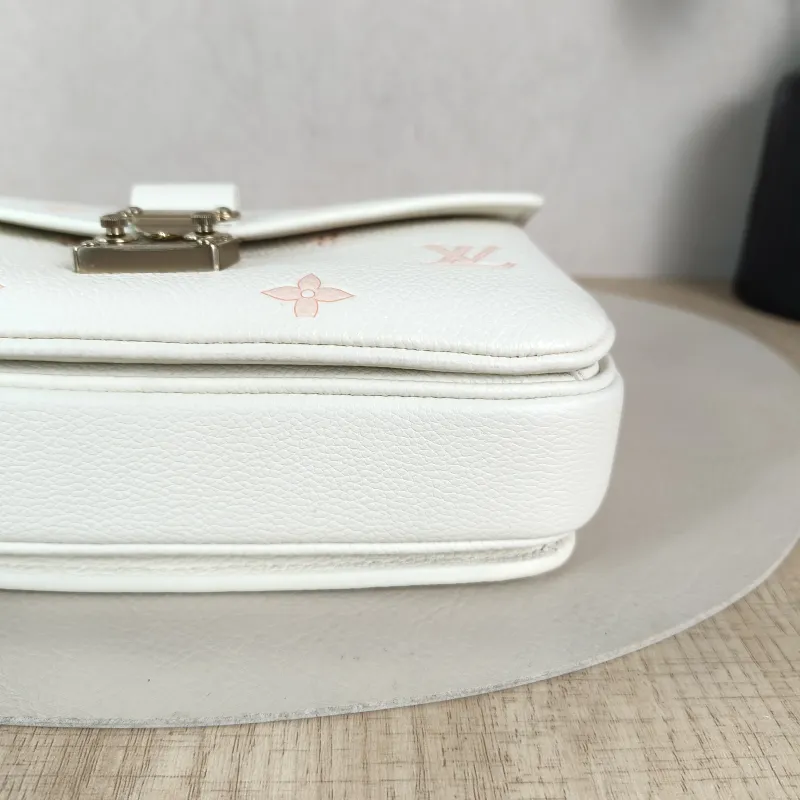 Louis Vuitton Crossbody Bag Pochette Métis East West White · Pink Monogram Empreinte Embossed Calfskin Small 21.5 × 6 × 13.5 cm — detail view 2 of 13