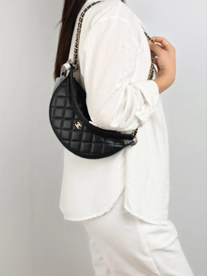 Chanel Crossbody Bag Top Handle Crossbody Bag Black Grained Calfskin 22 × 5.5 × 12 cm — on-model view 1 of 2