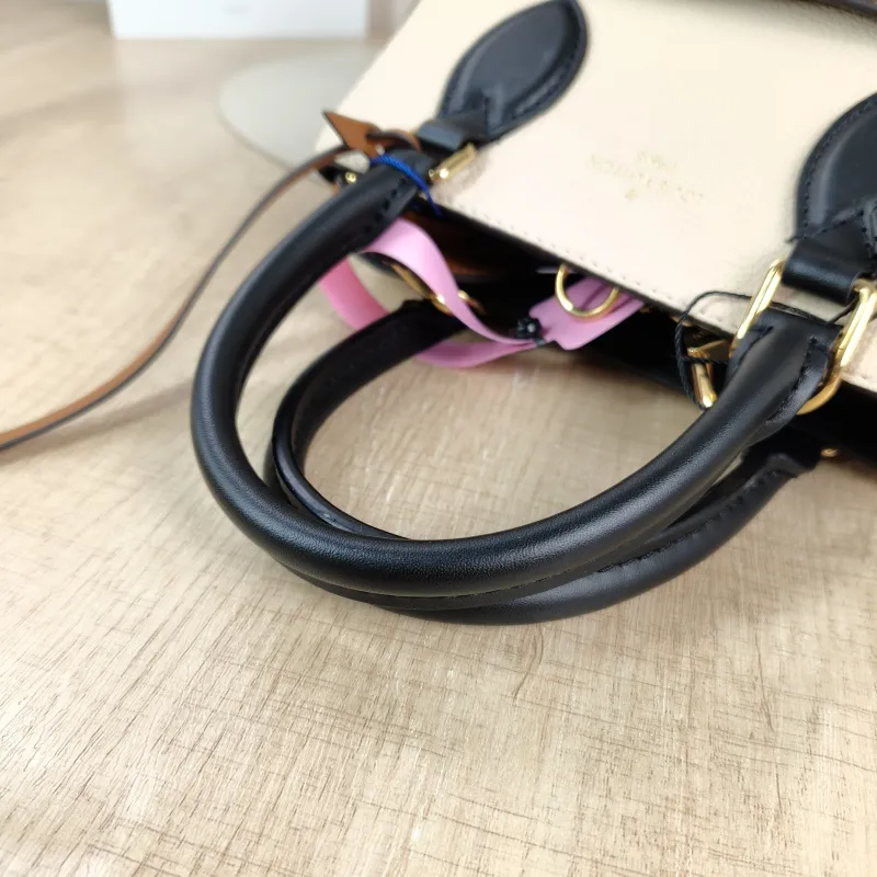 Louis Vuitton Top Handle Bag Fold Tote Colorblock PVC · Calfskin Small 20 × 18 × 22 cm — detail view 11 of 11