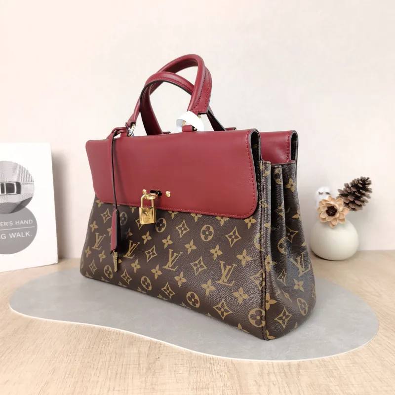 Louis Vuitton Shoulder Bag Venus Red PVC · Calfskin 34 × 12 × 22 cm — cover view 2 of 6