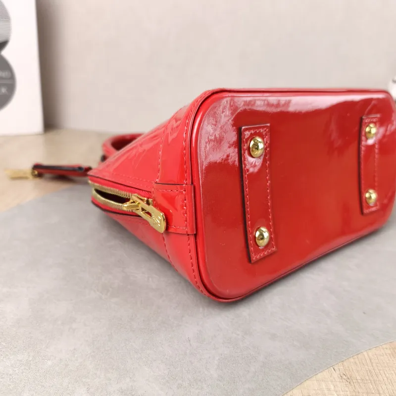 Louis Vuitton Crossbody Bag Alma BB Patent Leather BB 23.5 × 11.5 × 17.5 cm — detail view 9 of 11