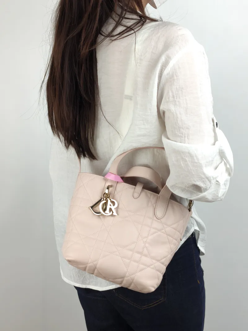 DIOR Top Handle Bag TOUJOURS Edition Pink Calfskin Small 18.5 × 12 × 18.5 cm — on-model view 1 of 2